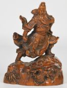 19thC Chinese boxwood carving of a general or warrior, 15cm tall.