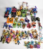 Over fifty 1980's action figures and vehicles to include GI Joe, Teenage Mutant Ninja Turtles (