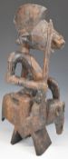African carved tribal figure of a mounted warrior, Senufo, Mali, 57cm tall.