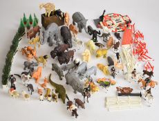 A collection of Britains plastic zoo animals together with an equestrian or show jumping set.