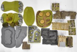 A collection of Games Workshop Warhammer and Warhammer 40K buildings and terrain with resin, plastic