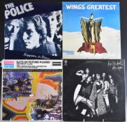 Approximately 40 albums including The Beatles, Alice Cooper, Roxy Music, etc