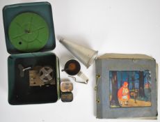 Bing Pigmyphone children's clockwork record player or gramophone, with three records.