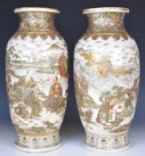 Pair of Japanese Satsuma vases decorated with figural scenes, with gilt rims, 45cm tall.