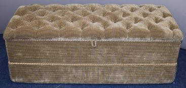 Victorian style upholstered ottoman with buttoned top or lid, opening to reveal storage space,