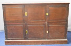 19thC mahogany sideboard with an arrangement of six cupboards accessed through hinged and sliding
