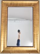 Pair of modern gilt framed mirrors, with bevelled glass and cushion style frames, overall size 116 x