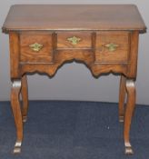 Oak antique style lowboy with three drawers, raised on cabriole legs, W74 x D50 x H73cm