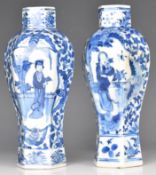 A pair of Chinese blue and white octagonal vases with figural decoration and four character mark