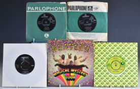 A collection of approximately 30 singles, mostly The Beatles