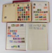 The Mercury and The Strand stamp albums and a stockbook containing GB and world stamps, all reigns