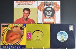 Approximately 300 singles M-P including Madness, Mungo Jerry, The Move, Olivia Newton John,