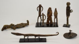 A collection of African bronzes from the estate of Anthony Powell, largest 17cm long.