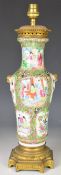 Chinese late 19th / early 20thC famille rose vase converted to a table lamp, with gilt metal