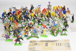 Approximately seventy Britains Deetail plastic on metal base medieval toy soldiers including