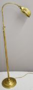 Floor standing brass extendable electric reading lamp with shell shade