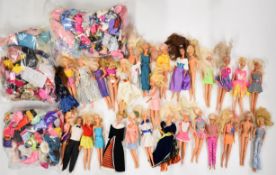 Thirty mostly 1990's Barbie fashion dolls together with a large collection of clothing and