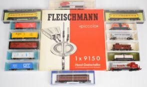 Two N gauge American diesel locomotives together with twelve various items of rolling stock and a