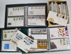 A large quantity of GB first day covers, loose and in three albums plus empty cover album