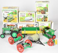 Kovap tinplate clockwork tractor made in the Czech Republic, together with five tow along