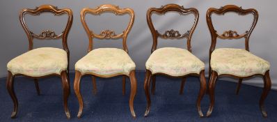 Set of four Victorian mahogany upholstered balloon back dining chairs