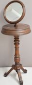 Victorian mahogany shaving / vanity stand with turned support and raised on three carved legs, 127 x