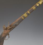 Middle Eastern flintlock jezail rifle with East India Trading Company lion impressed to the lock,
