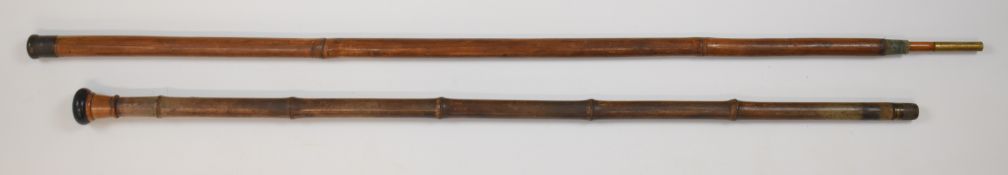 A bamboo walking stick blowpipe with brass screw fittings and a similar three piece fishing rod,