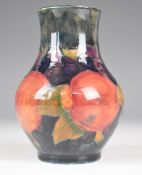 Moorcroft pottery pedestal vase decorated in the Pomegranate pattern, height 12.5cm