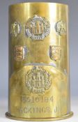 Two brass shell cases one dated 1937, the other 1936 decorated with insignia for the Essex