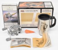 Abu Ambassadeur 6600AB multiplier fishing reel and stainless steel mug, boxed gift set, new / unused