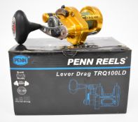 Penn TRQ 100LD multiplier fishing reel, boxed with accessories