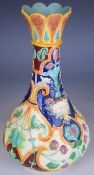 Copeland majolica vase with mask decoration and Worlock Collection label to base, height 23cm