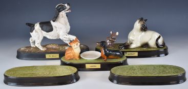 Beswick figures 'The Spaniel', Watch It and Sharing, with spare plinths, tallest 20cm