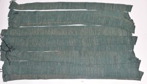 Fifteen shotgun or rifle slips or sleeves with drawstring ends, each 140cm long.