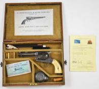 Deactivated Remington style .44 Henry six-shot single action revolver with shaped bone grips, belt