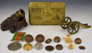 WW1 Princess Mary Christmas tin, WW2 Defence Medal, two small brass cannon and Royal Inniskilling