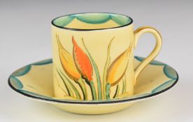 Susie Cooper for Gray's Pottery Art Deco coffee can and saucer with hand decoration of flowers,