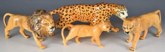 Beswick lion family and a leopard, tallest 15cm