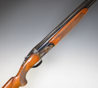 Franchi 12 bore over and under ejector shotgun with engraved locks, underside, thumb lever and