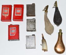 Ten vintage powder tins and flasks including three Curtis's and Harvey's Sporting Gunpowder.
