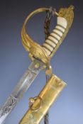 Royal Navy 1827 pattern officer's sword with fold down guard named E J H Kirby, lion head pommel,