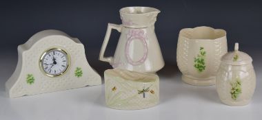 Belleek jug and cache pot with dragonfly decoration, Donegal clock etc, tallest 16cm