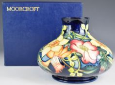 Moorcroft squat pedestal vase decorated in the Golden Jubilee pattern 2002, height 17cm, with box