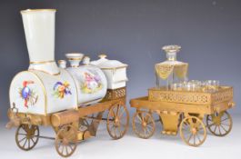 J B Toselli 19thC porcelain cafetiére in the form of a steam locomotive decorated with Watteau