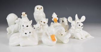 A collection of Royal Osborne porcelain bird and animal figures including owl, foxes, rabbits, hippo