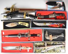Ten replica knives / daggers including Kukri, Egyptian Pharaoh dagger and North American hunting