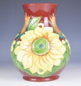 Moorcroft baluster vase decorated in the Inca Sunflower pattern by Janet Kirkland, height 24cm