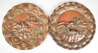WW2 North Africa campaign interest pair of copper trench art wall plates, one depicting a camel with