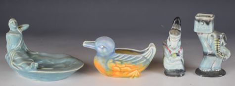 Four Beswick novelty / comical figures comprising blue ware figural elephant holding up 5 tons